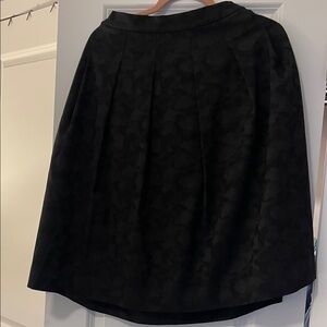Elegant Black A-Line Skirt with Subtle Pattern